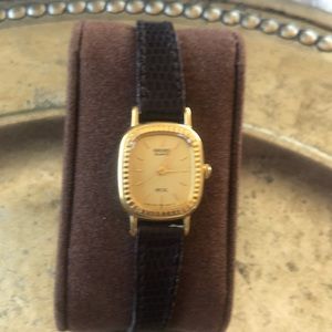 Petite vintage Seiko SX gold dial and brown strap